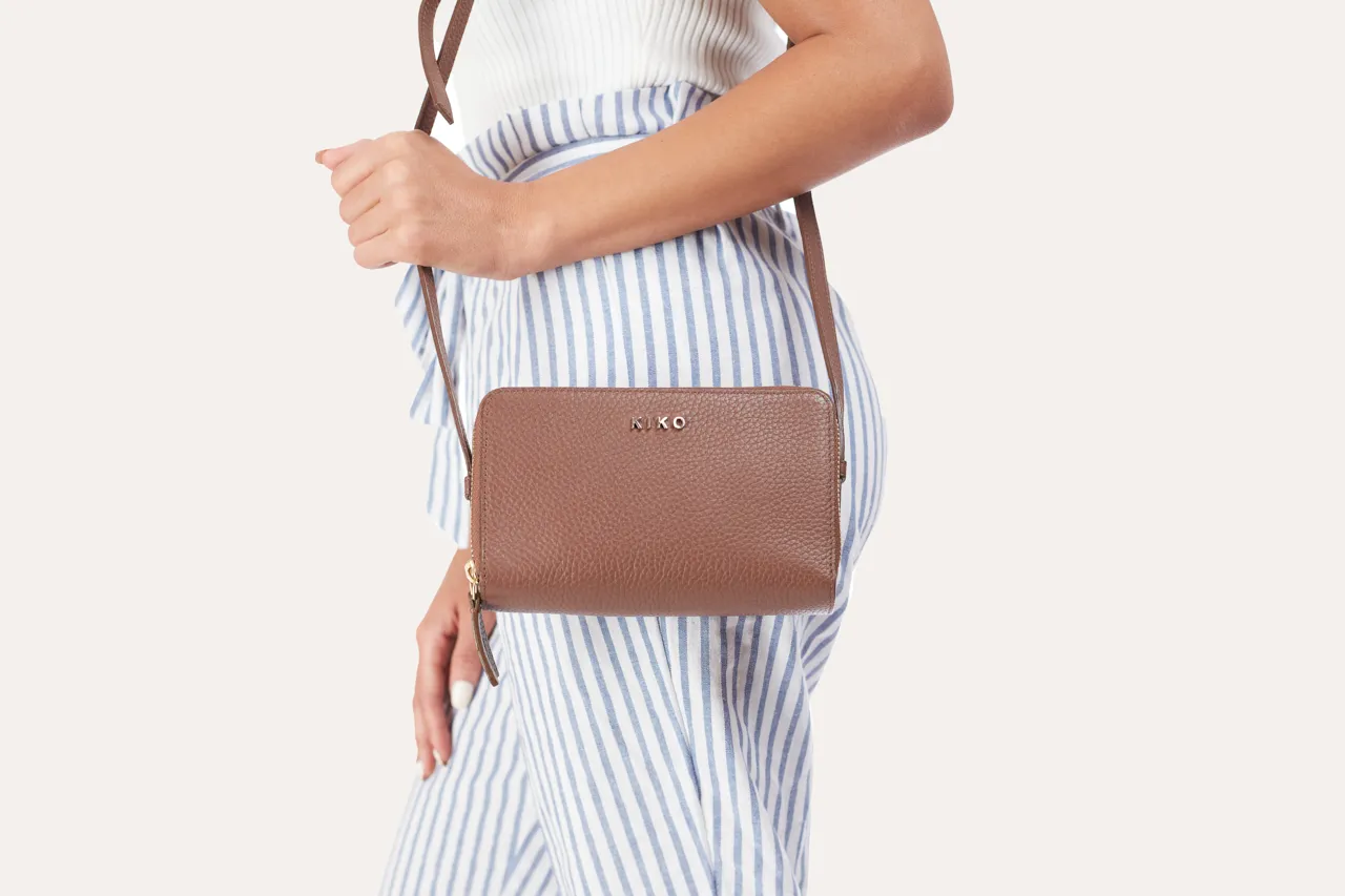 Pebble Leather Compact Crossbody Clutch